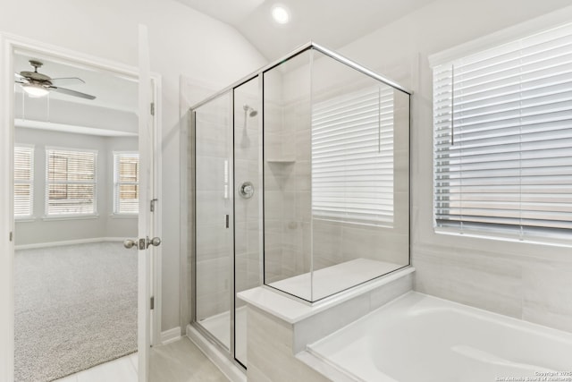 bathroom featuring tile patterned flooring, vaulted ceiling, ceiling fan, and independent shower and bath