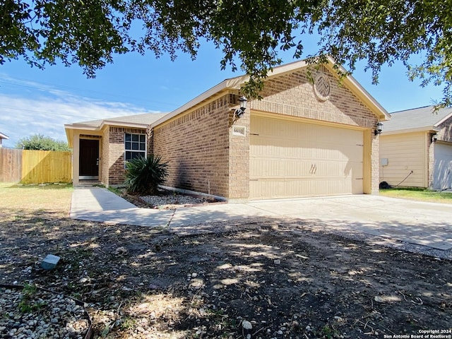 ranch-style home with a garage