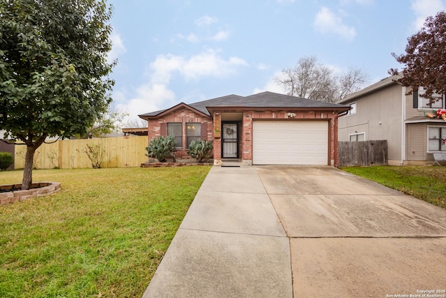 view of front of property with a garage and a front lawn