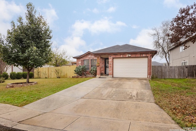 ranch-style house featuring a front yard and a garage