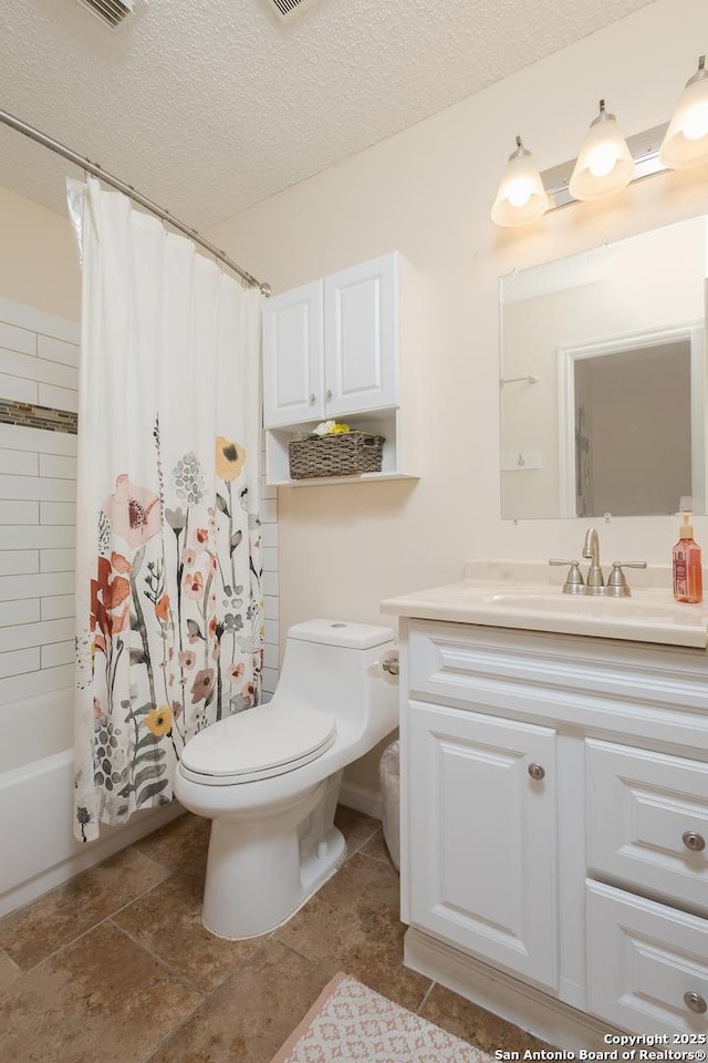 full bathroom featuring vanity, toilet, shower / bath combo, and a textured ceiling