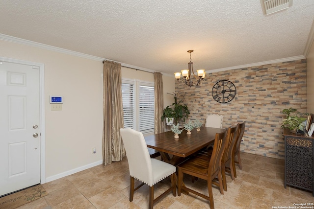 dining space featuring a textured ceiling, an inviting chandelier, and crown molding