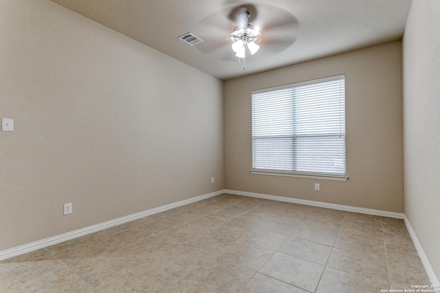 empty room with ceiling fan