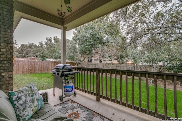 view of patio featuring a grill