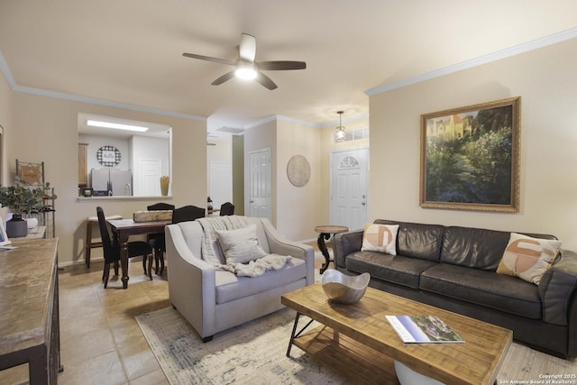 living room featuring light tile patterned floors, ceiling fan, and ornamental molding