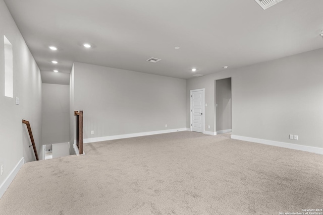 empty room with carpet flooring