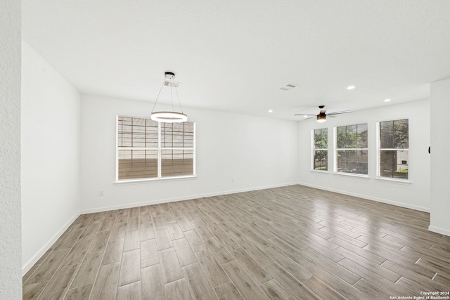 spare room with ceiling fan