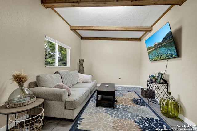 living room with tile patterned flooring and beam ceiling