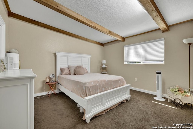 carpeted bedroom featuring beamed ceiling and a textured ceiling