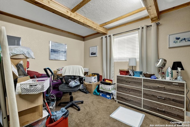 carpeted office with beamed ceiling and a textured ceiling