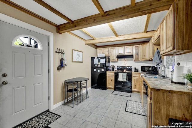 kitchen with sink, decorative backsplash, light brown cabinetry, light tile patterned floors, and black appliances