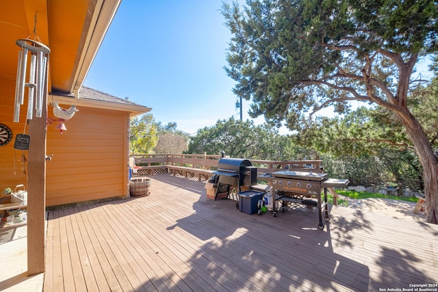 wooden deck with area for grilling