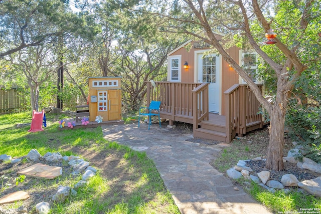 view of yard with a deck