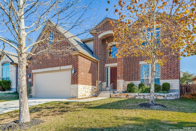 view of property with a front yard and a garage