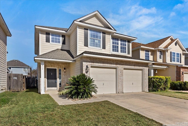 view of front of home with a garage and a front lawn