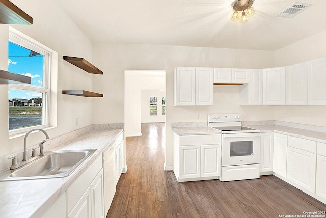 kitchen with white cabinets, white range with electric stovetop, dark hardwood / wood-style flooring, and sink