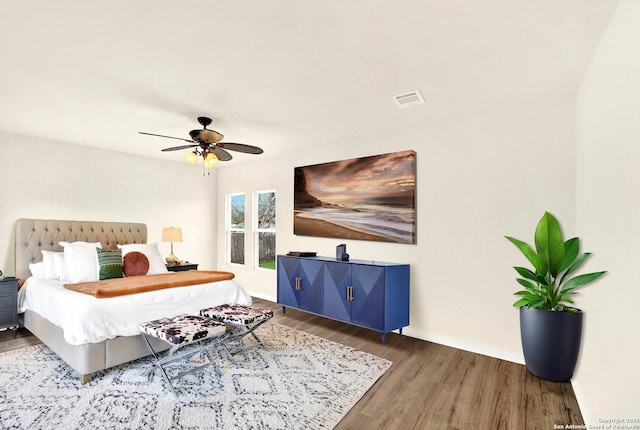 bedroom featuring ceiling fan and hardwood / wood-style flooring