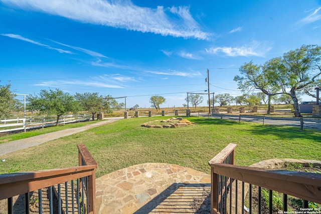 view of yard featuring a patio and a rural view