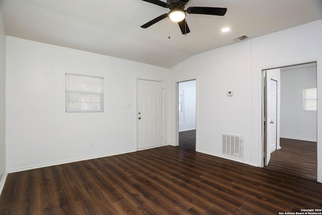 unfurnished room with dark hardwood / wood-style floors, ceiling fan, and lofted ceiling