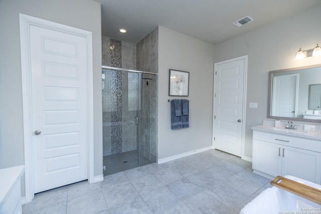 bathroom featuring vanity and walk in shower