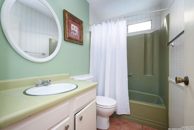 full bathroom with tile patterned floors, vanity, shower / bath combination with curtain, and toilet