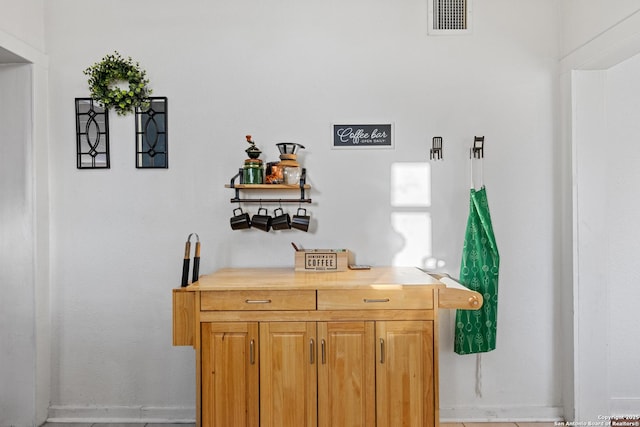 bar featuring butcher block countertops