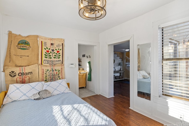 bedroom featuring dark hardwood / wood-style flooring