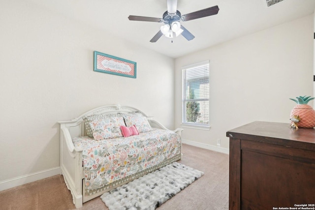 carpeted bedroom featuring ceiling fan