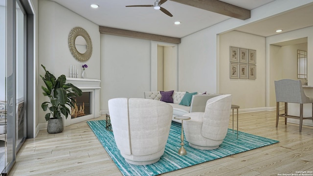 interior space featuring ceiling fan, beam ceiling, and light hardwood / wood-style floors