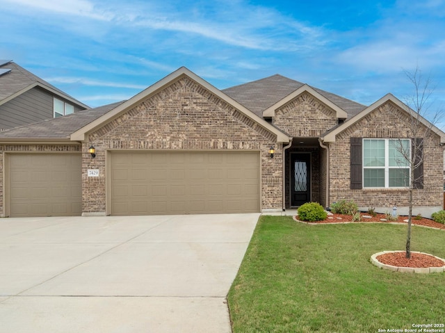 craftsman-style home featuring a front lawn and a garage