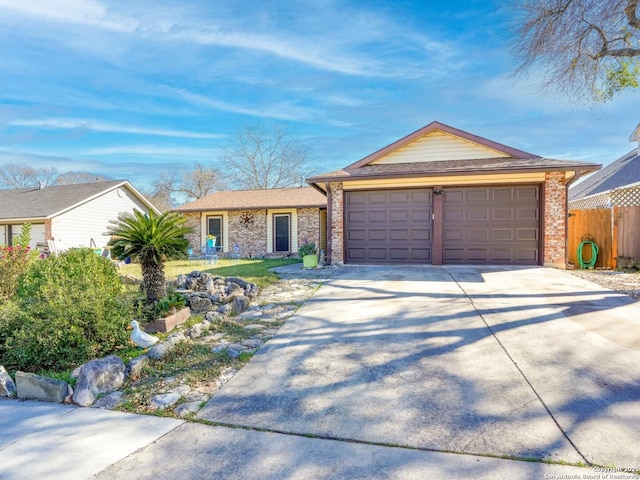 ranch-style house featuring a garage