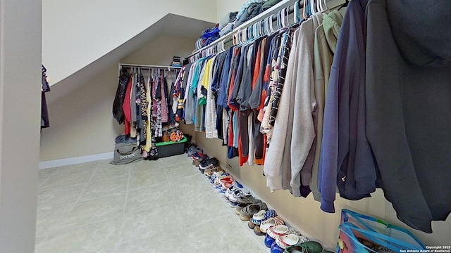 spacious closet with tile patterned flooring