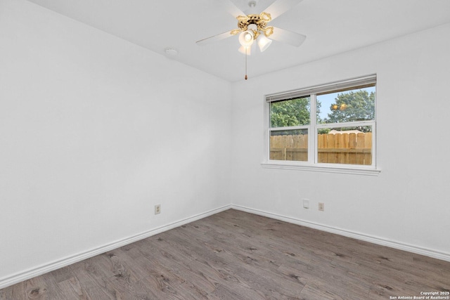 unfurnished room featuring ceiling fan and wood-type flooring