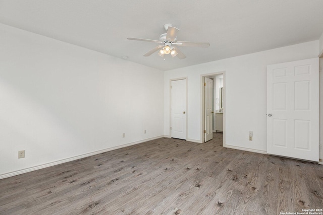 unfurnished bedroom with ceiling fan and light hardwood / wood-style flooring