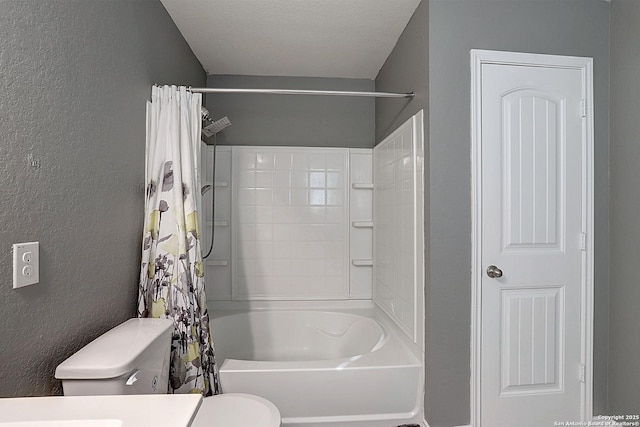 full bathroom with vanity, shower / bath combination with curtain, a textured ceiling, and toilet