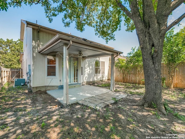 back of property featuring a patio area and ceiling fan