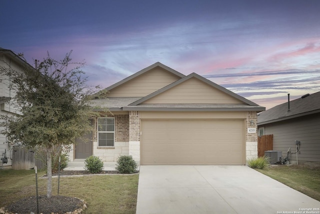 4215 Gossan Spgs, San Antonio, TX 78253 - view of front facade with a lawn, central AC, and a garage