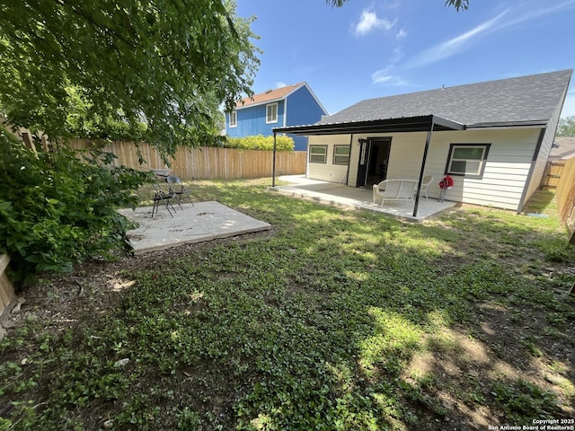 7438 Rimhurst, San Antonio, TX 78250 - fenced backyard featuring a patio area