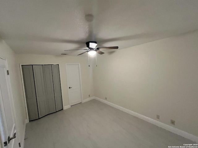 unfurnished bedroom with ceiling fan