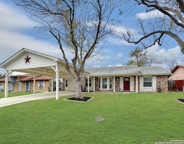 single story home featuring a front yard and a carport