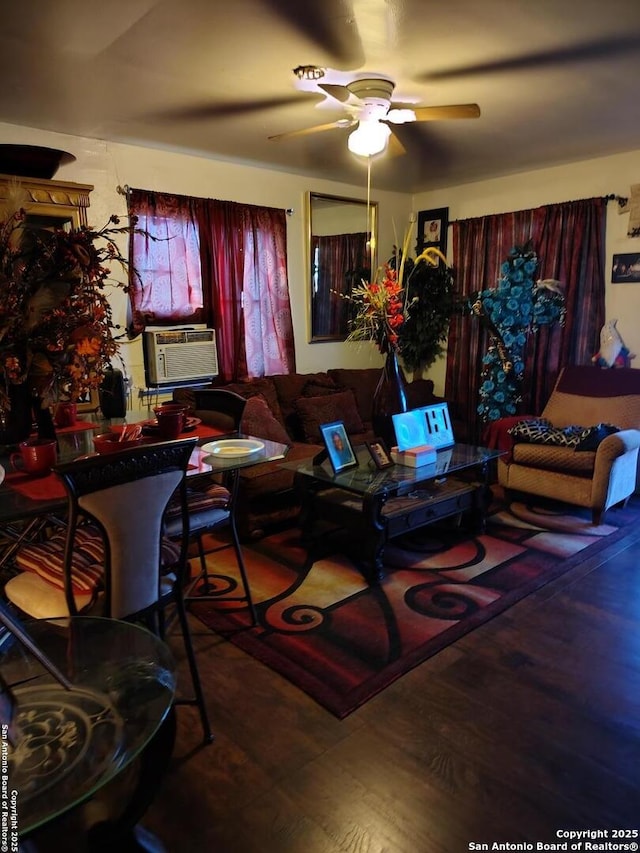 living room featuring hardwood / wood-style flooring, ceiling fan, and cooling unit