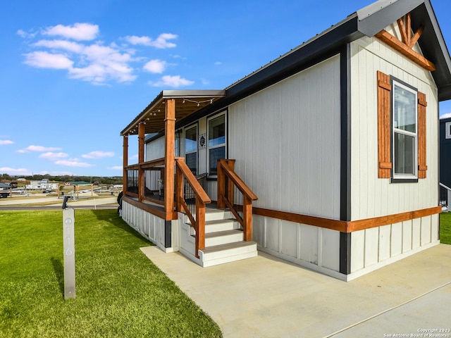 view of home's exterior featuring a yard