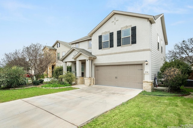 view of front facade featuring a garage and a front lawn