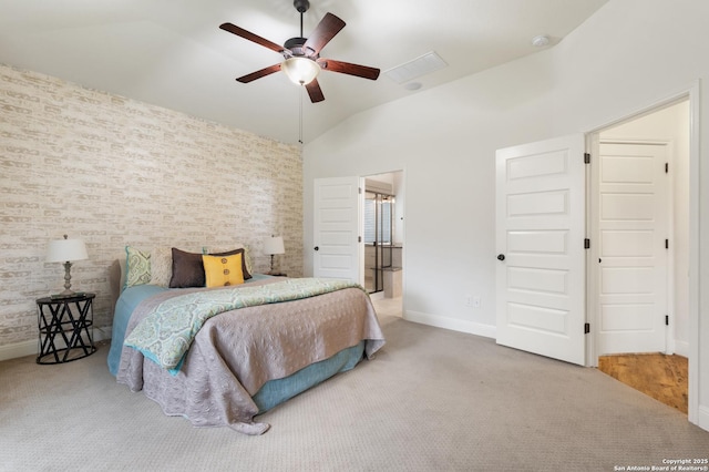 carpeted bedroom featuring ceiling fan and vaulted ceiling