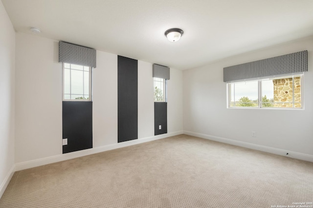 unfurnished room with carpet