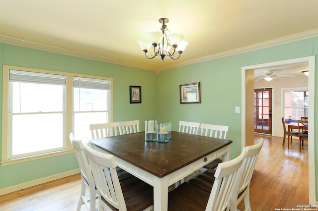 951 W Coll St, New Braunfels, TX 78132 - dining area with plenty of natural light, ornamental molding, and light hardwood / wood-style flooring