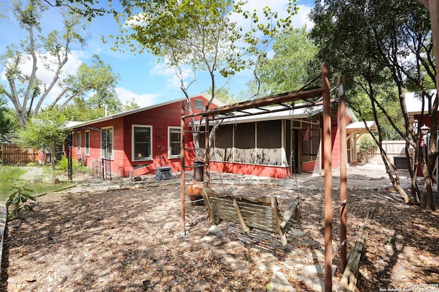 951 W Coll St, New Braunfels, TX 78132 - rear view of house with central AC unit