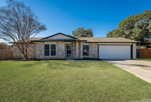 ranch-style house featuring a garage and a front yard