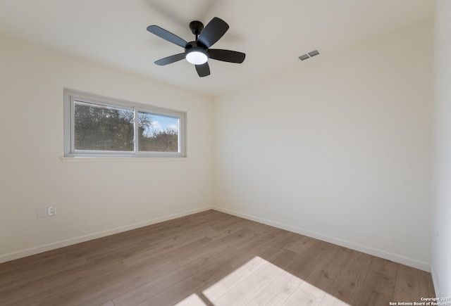 unfurnished room with light hardwood / wood-style floors and ceiling fan