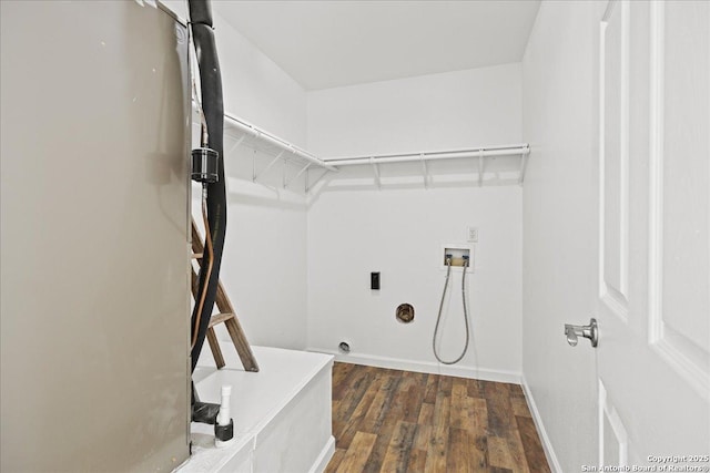 laundry area featuring hookup for an electric dryer, washer hookup, and dark wood-type flooring